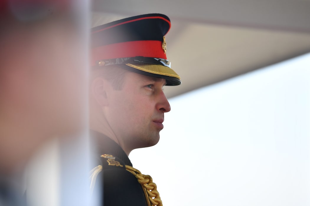 Britain's Prince William, Duke of Cambridge representing Britain's Queen Elizabeth II inspects the graduating officer cadets during the Sovereign's Parade at the Royal Military Academy, Sandhurst, southwest of London on December 14, 2018.
