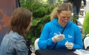 The Africa to Aotearoa team collected cheek swabs from people in major cities, as well as from several ethnic groups in New Zealand. Lisa Matisoo-Smith is seen processing a sample.