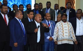 Papua governor, Lukas Enembe, speaks to a plenary meeting of the provincial parliament about armed conflict in the Highlands.