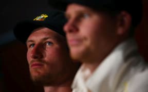 Australian player Cameron Bancroft (l) and Australian captain Steve Smith (r) during a post Test press conference