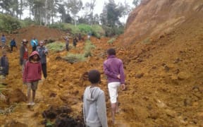 A landslide cutting of the tambul mendi road following a 7.5 earthquake.
