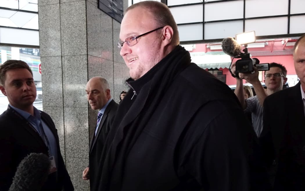 Kim Dotcom heading into the Auckland District Court for the last part of his bail hearing.