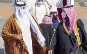 Crown Prince Mohammed bin Salman (right) welcoming Emir of Qatar Tamim bin Hamad Al-Thani (left) upon his arrival in al-Ula, Saudi Arabia, for the 41st Gulf Cooperation Council (GCC) summit on January 5, 2021.