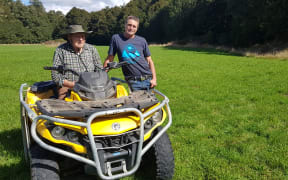 Aaran Bruce and his father, 89-year-old Jim Bruce, who cleared most of the land, starting in 1944. The trees in the background are regenerating beech forest; the original trees were felled 30 years ago for beech chip.