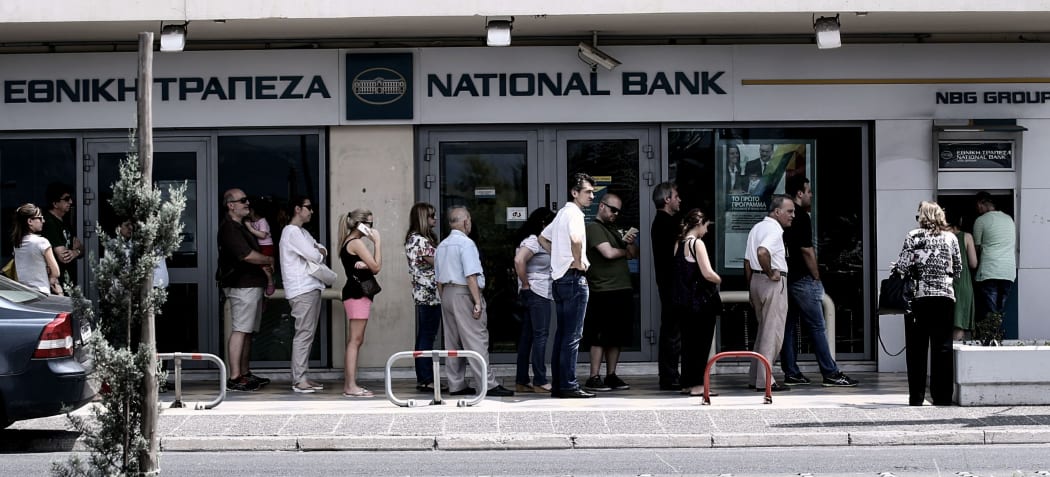 Queues formed at bank ATM machine over the weekend.