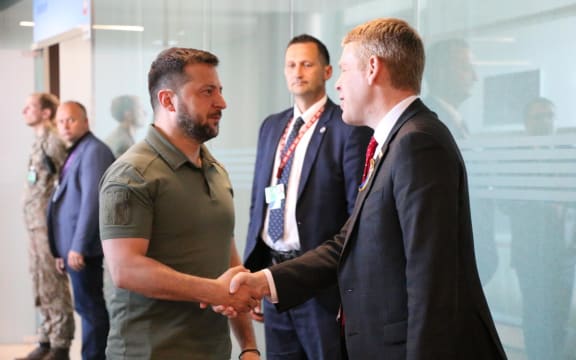 Ukrainian president Volodymyr Zelensky and Prime Minister Chris Hipkins shake hands at the NATO summit in Vilnius. A planned bilateral meeting between the two leaders had to be abandoned as they ran out of time.