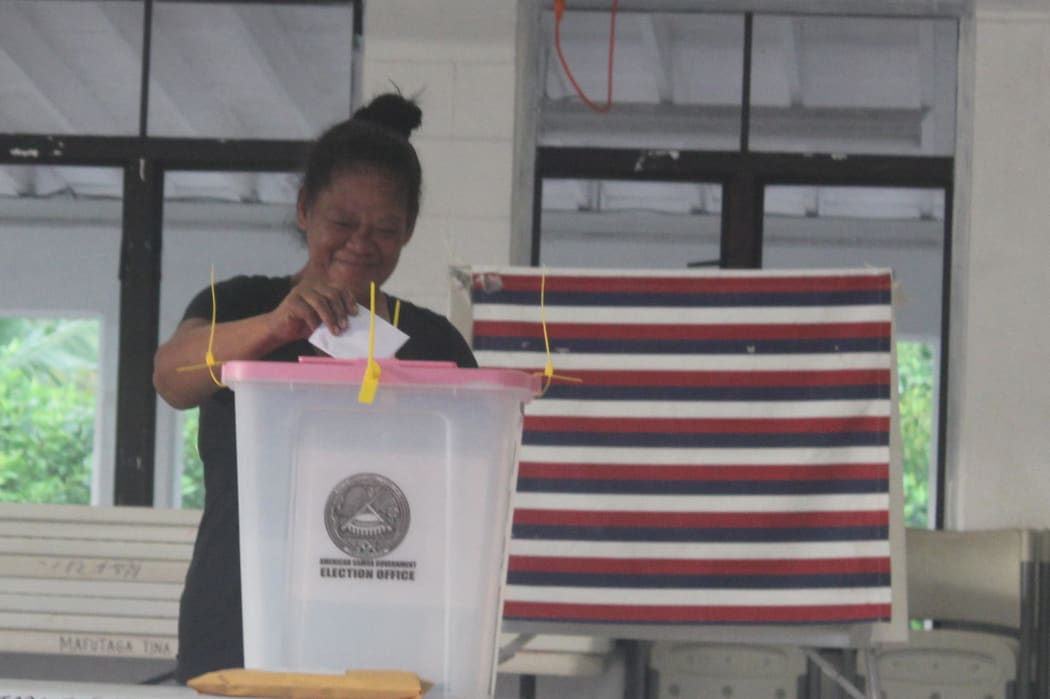 A voter casting a ballot in American Samoa