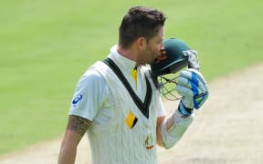 Michael Clarke celebrates his century on day two in Adelaide