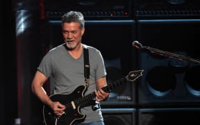 Eddie Van Halen of Van Halen performs onstage during the 2015 Billboard Music Awards.