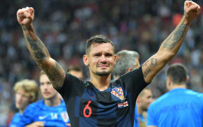 Croatia's Dejan Lovren celebrates his team's 2-1 victory at the World Cup semifinal soccer match against England.