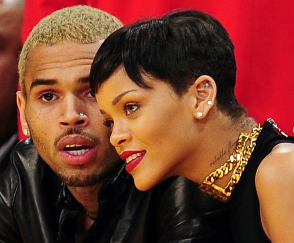 Rihanna and Chris Brown attending a basketball game in Los Angeles in 2012.