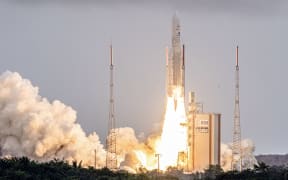 Arianespace's Ariane 5 rocket with NASAs James Webb Space Telescope onboard lifts up from the launchpad, at the Europes Spaceport, the Guiana Space Center in Kourou, French Guiana, on December 25, 2021.
