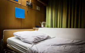 Empty hospital bed, generic