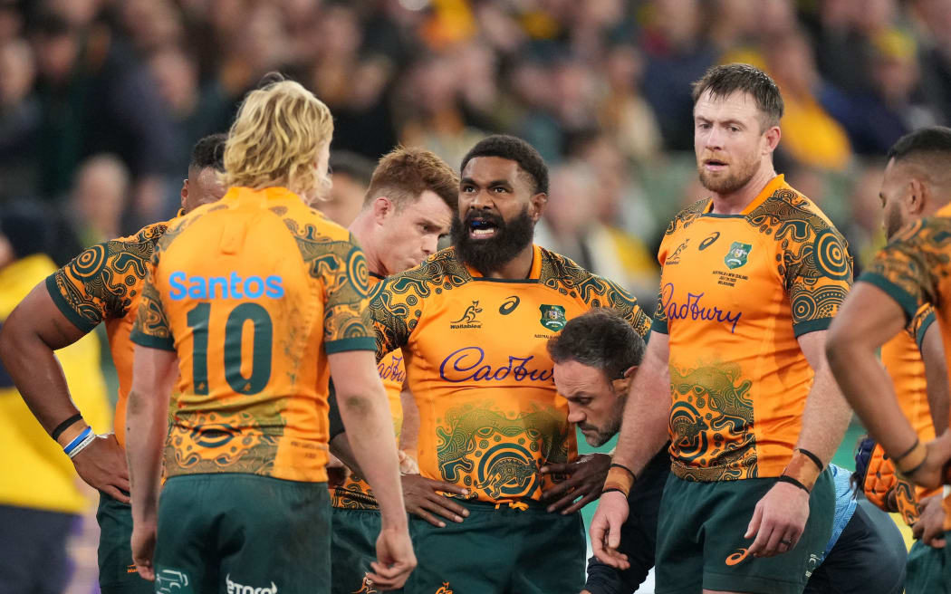 Marika Koroibete of the Wallabies looks dejected after a try to the All Blacks.