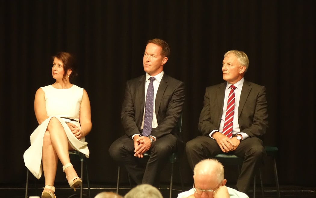 Leading mayoral contenders, from left, Victoria Crone, Mark Thomas and Phil Goff on stage together for the first time.