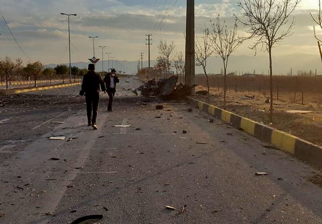 A handout photo made available by Iran state TV (IRIB) on November 27, 2020, shows the damages after an attack targeted the car of Iranian nuclear scientist Mohsen Fakhrizadeh near the capital Tehran.