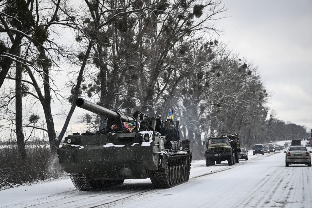 An Ukrainian tank rolls along a main road on 8 March 2022.