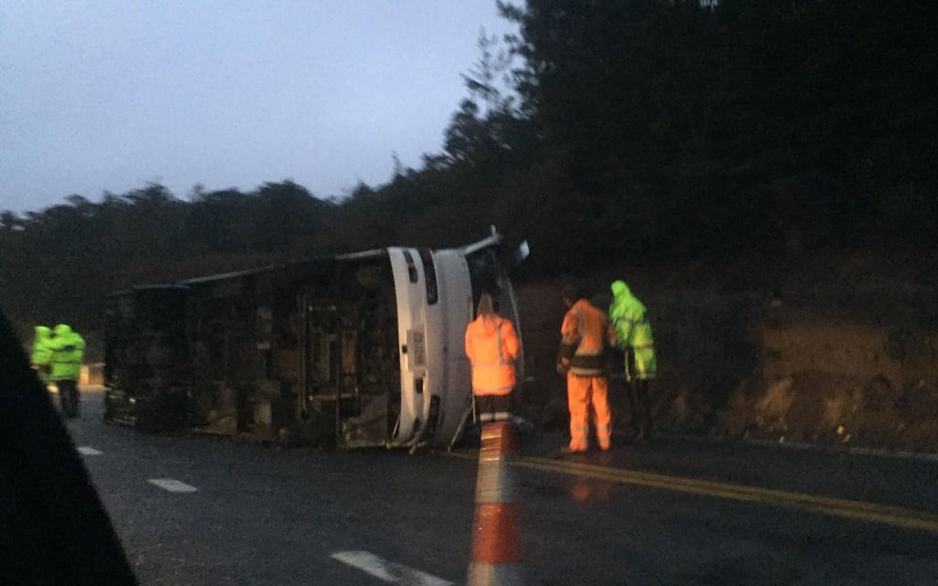The bus is still on its side and a salvage team will work to remove it.