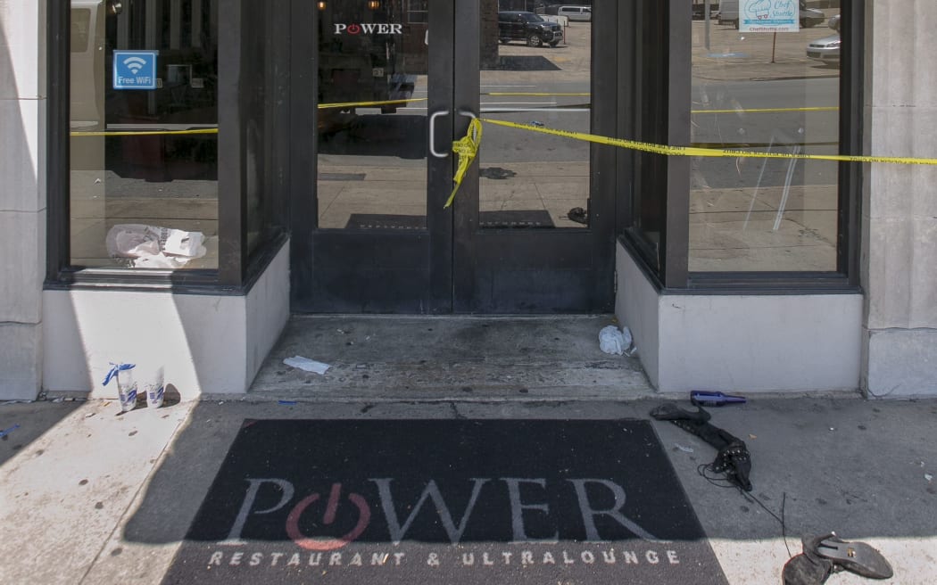 Police tape surrounds the Ultra Power Lounge as Little Rock Police Department detectives and crime scene personnel collect evidence on July 1, 2017 in Little Rock, Arkansas following a shooting which injured 28 people.
