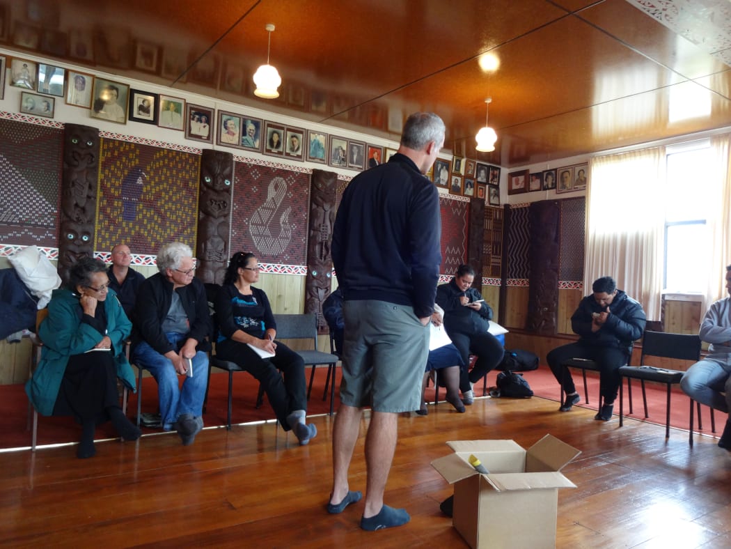GNS Science palaeoclimate scientist Richard Levy is sharing the stories of the rocks he has brought to the marae to explain how geologists glean information from them.