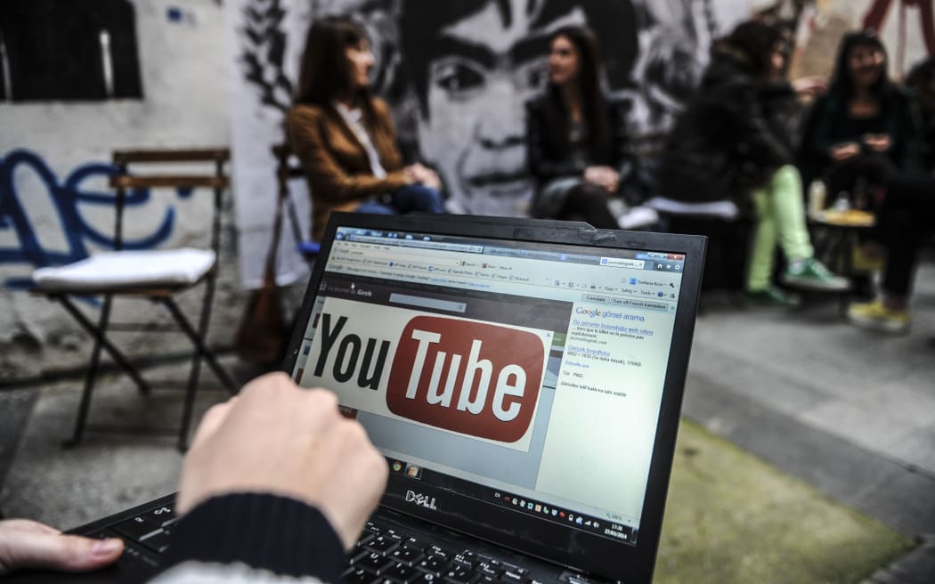 Laptop showing YouTube logo being used in Turkey.