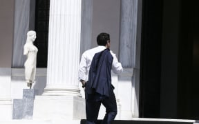 Greece's Prime Minister, Alexis Tsipras arrives at Maximos Mansion to attend a cabinet meeting.