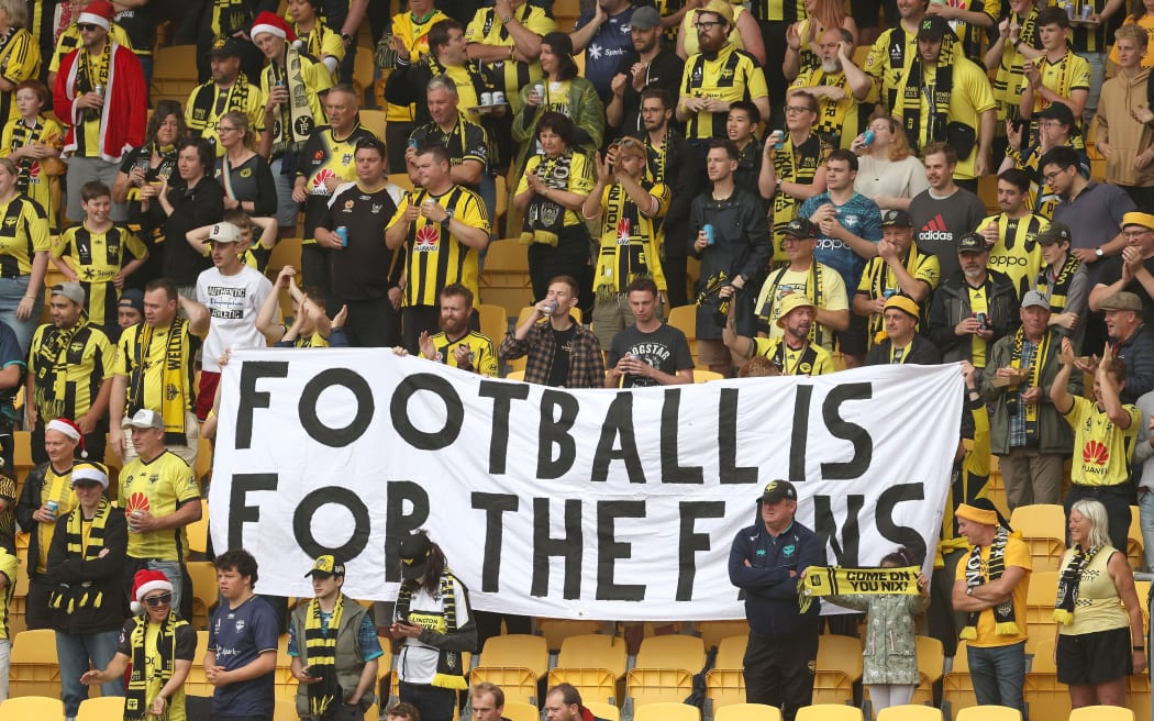 Phoenix fans protest the decision of A-League bosses to award the next three grand finals to Sydney FC.