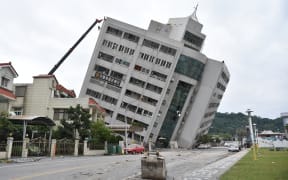A building is tilted in quake-hit Hualien County, southeast China's Taiwan.