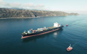 The MV Shiling is towed into Wellington harbour by the tug Skandi Emerald on Wednesday 23 May 2023.