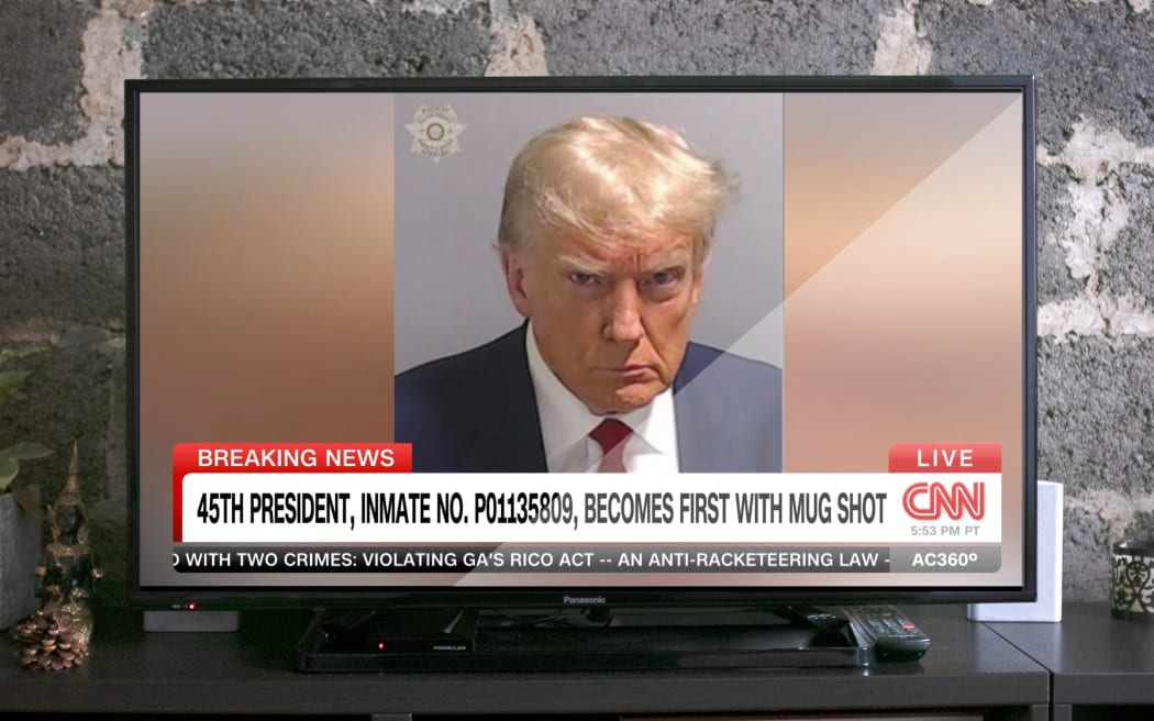 Descripción - El 45º presidente de los Estados Unidos, Donald Trump, es el recluso núm.  PO1135809 fue el primero en tener una foto policial.  23 de agosto de 2023, Atlanta, Georgia (EE. UU.), captura de pantalla de CNN.  Descripción - Le 45e presidente des Etats-Unis, Donald Trump, matrícula PO1135809, devient le premier president americain avec une photo de tenu.  El 23 de agosto de 2023, Atlanta, Georgia (EE.UU.), capturado por pantalla de CNN.  (Foto de David Himbert / Hans Lucas / Hans Lucas vía AFP)