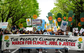 Protesters take part in the People's Climate March in Portland, US.