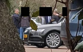 Alleged Russian agents in a parking lot near the OPCW in The Hague in April during the intervention of Dutch officers.