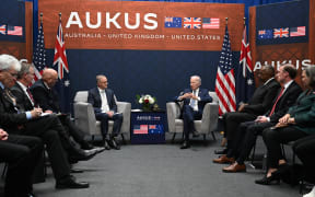 US President Joe Biden (R) meets with Australian Prime Minister Anthony Albanese (L) during the AUKUS summit at Naval Base Point Loma in San Diego California on March 13, 2023. - AUKUS is a trilateral security pact announced on September 15, 2021, for the Indo-Pacific region. (Photo by Jim WATSON / AFP)