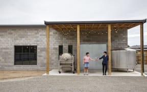 Alexia Winemaker Jane Cooper and her wife Lesley Reidy at their purpose-built urban winery in Greytown.