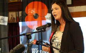 Willow-Jean Prime speaking to a crowd of people at Kaikohe RSA.