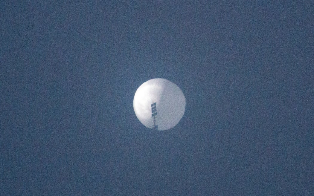 This handout photo from Chase Doak taken on February 1, 2023 and released on February 2 shows a suspected Chinese spy balloon in the sky over Billings, Montana. - The Pentagon said February 2 it was tracking a Chinese spy balloon flying high over the United States, reviving tensions between the two countries just days ahead of a rare visit to Beijing by the top US diplomat. (Photo by Chase DOAK / CHASE DOAK / AFP) / -----EDITORS NOTE --- RESTRICTED TO EDITORIAL USE - MANDATORY CREDIT "AFP PHOTO / CHASE DOAK " - NO MARKETING - NO ADVERTISING CAMPAIGNS - DISTRIBUTED AS A SERVICE TO CLIENTS