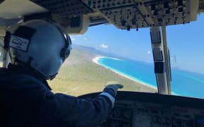 The RACQ CQ Rescue helicopter on the flight to rescue a shark victim at the Whitsunday Islands in Australia.