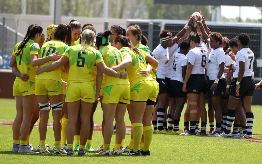 Australia and Fiji huddle before their clash at the Clermont-Ferrand Sevens.