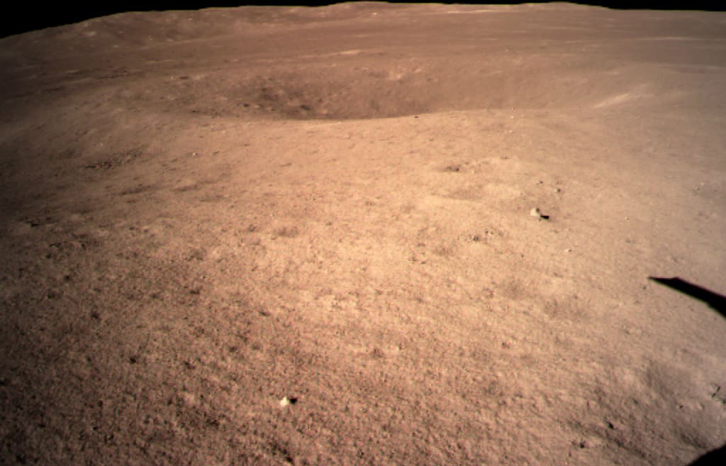 The image from the China National Space Administration shows the first image of the moon's far side taken by China's Chang'e-4 probe.