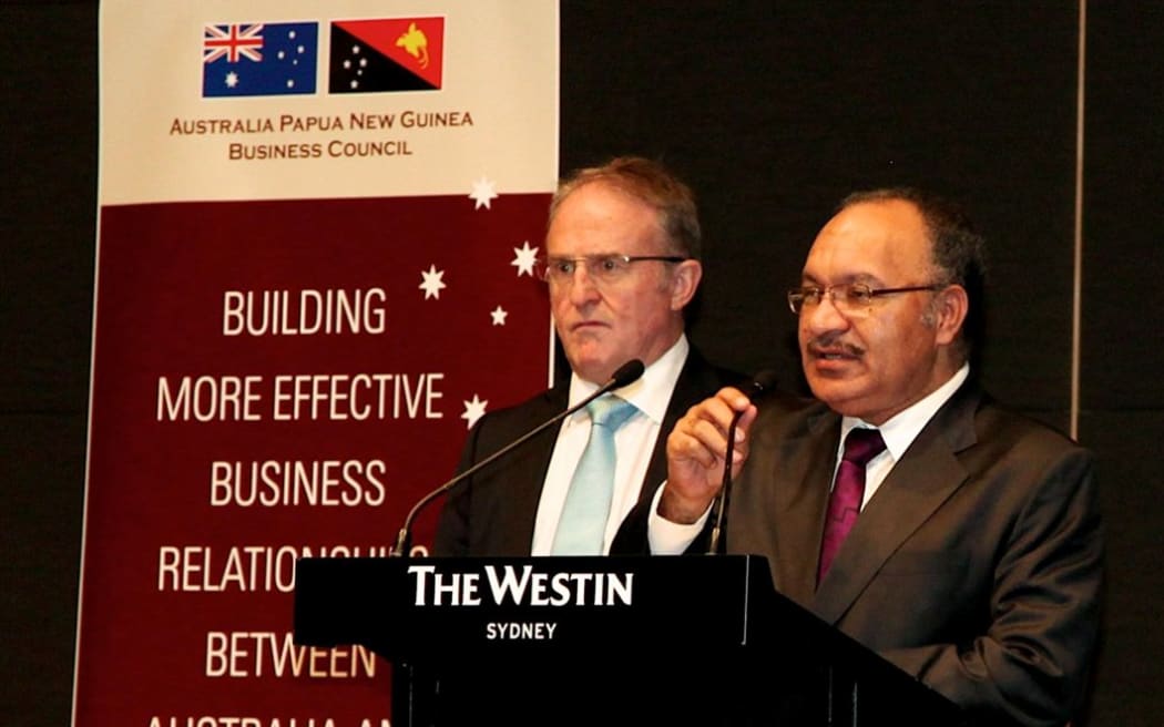 Papua New Guinea Prime Minister Peter O’Neill (right) with Ian Clarke, Past President, Australia PNG Business Council.