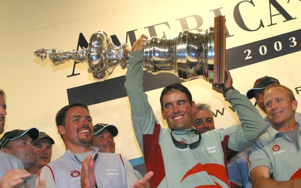 Russell Coutts celebrates 2003 America's Cup win with Alinghi.
