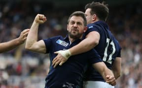 Scotland captain Greig Laidlaw celebrates his match-winning try, flanked by Tommy Seymour (L) and Matt Scott (R) late in the game against Samoa, Rugby World Cup, St James' Park, Newcastle 10 October 2015
***PLEASE CREDIT: FOTOSPORT/DAVID GIBSON***