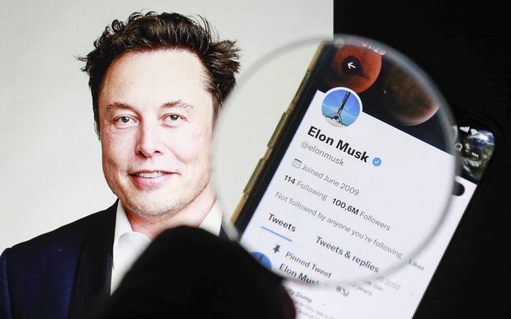 ISTANBUL, TURKIYE - JULY 9: In this photo illustration Tesla and SpaceX CEO Elon Musk's twitter profile is displayed on a mobile phone screen and the image of Elon Musk is displayed on a computer screen in Istanbul, Turkiye on July 9, 2022. Tesla CEO Elon Musk announced Friday that he is pulling out of his $44 billion deal to buy Twitter. Celal Gunes / Anadolu Agency (Photo by Celal Gunes / ANADOLU AGENCY / Anadolu Agency via AFP)