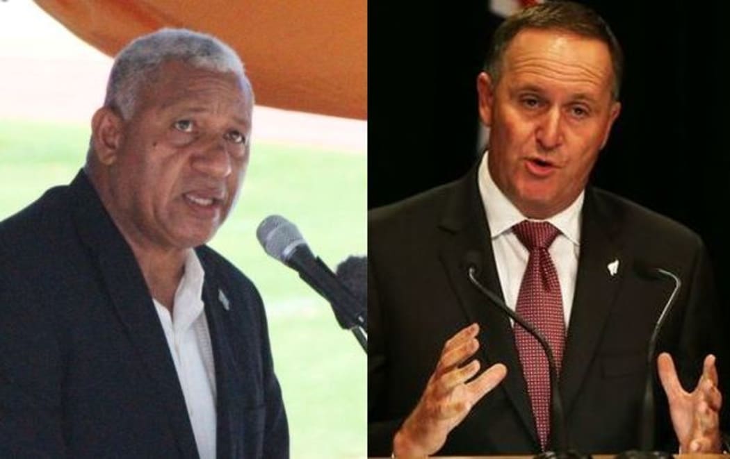 Fiji Prime Minister Frank Bainimarama (L) and New Zealand Prime Minister John Key.
