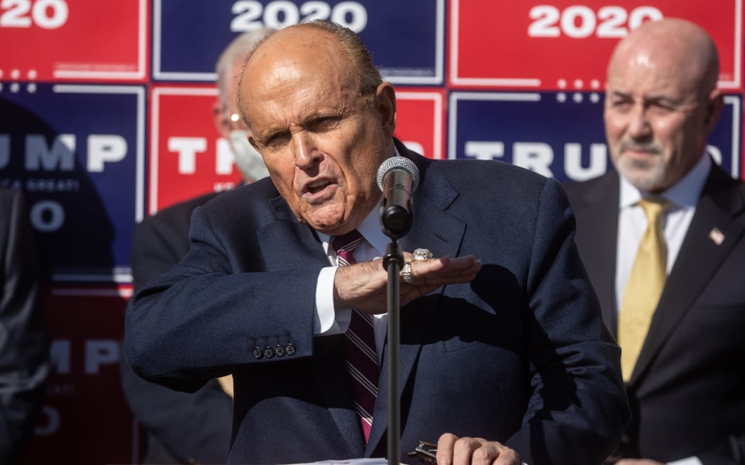 Attorney for the US President, Rudy Giuliani speaks to the media at a press conference held in the back parking lot of Four Seasons Total Landscaping on 7 November, 2020 in Philadelphia, Pennsylvania.
