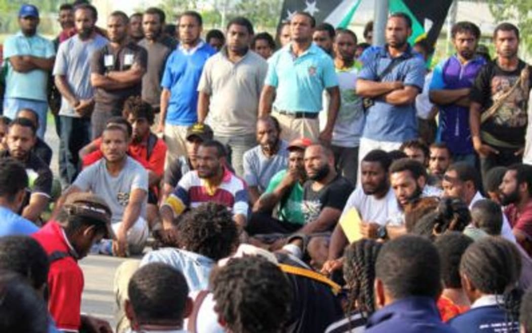 Students gather on the UPNG campus.