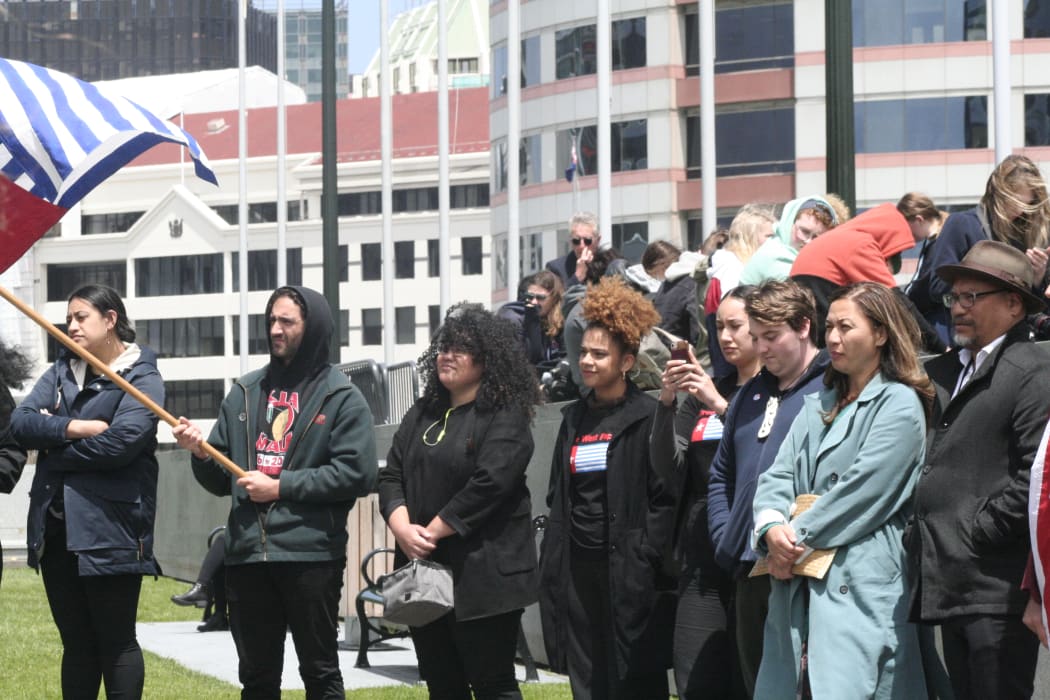 Green Party MPs Marama Davidson and Teanau Tuiono (far right) attend a demonstration at parliament to mark the 59th anniversary of the day West Papuans first raised their nationalist Morning Star flag. 1 December, 2020.