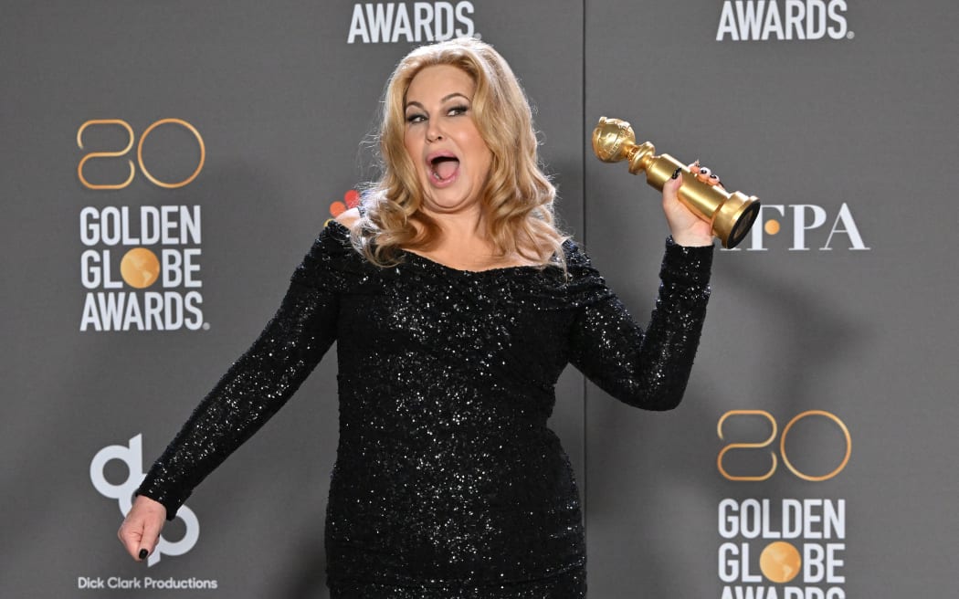US actress Jennifer Coolidge poses with the award for Best Supporting Actress - Television Limited Series/Motion Picture for 
