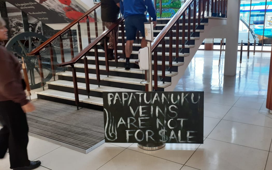 Signs greeting attendees at the water consent meeting at Whanganui War Memorial Centre.