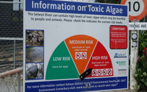 Information sign has arrow lined up on "high risk"
